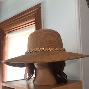Stylish tan brimmed sun hat with gold chain accent paper cotton polyester blend